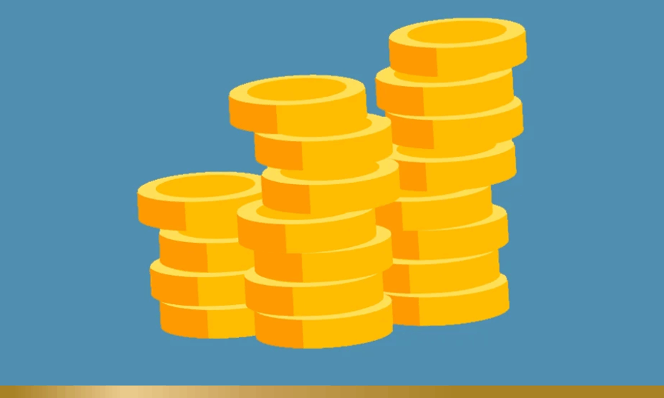 Stack of coins on blue background