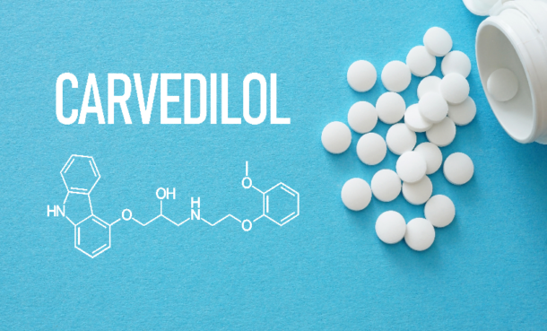 White pills on blue background, chemical drawing of Carvedilol