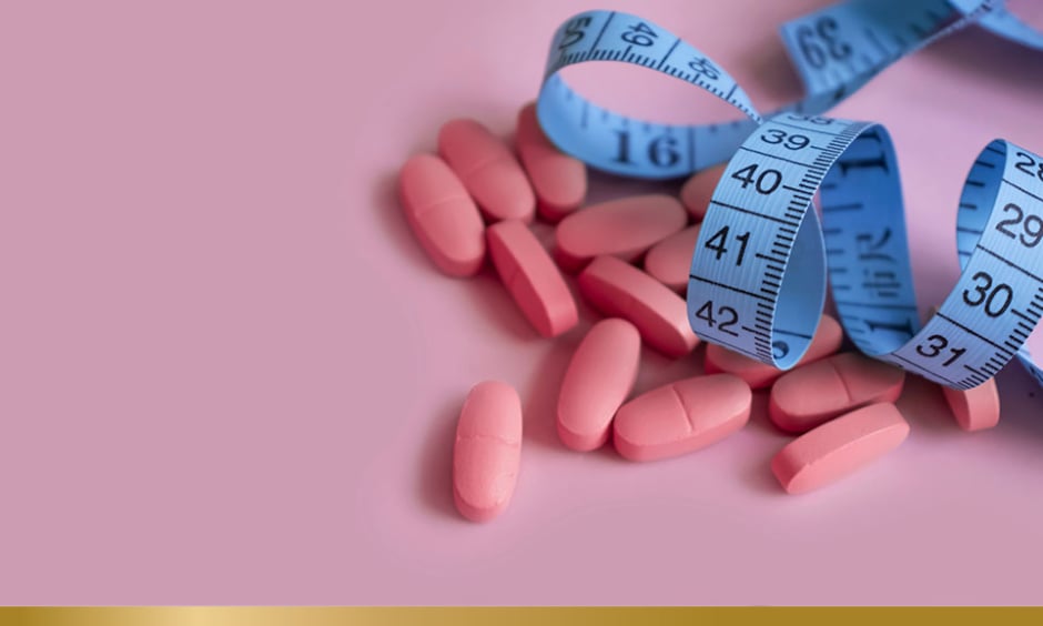 pills and measuring tape