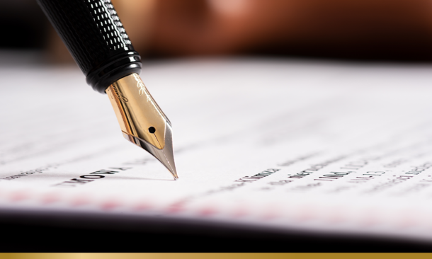 Fountain pen signing a contract