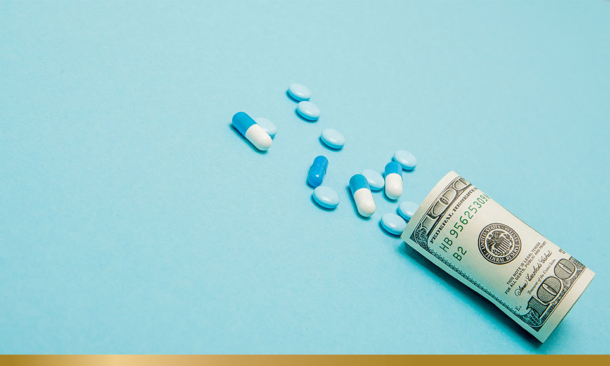 A dollar note with pills and capsules
