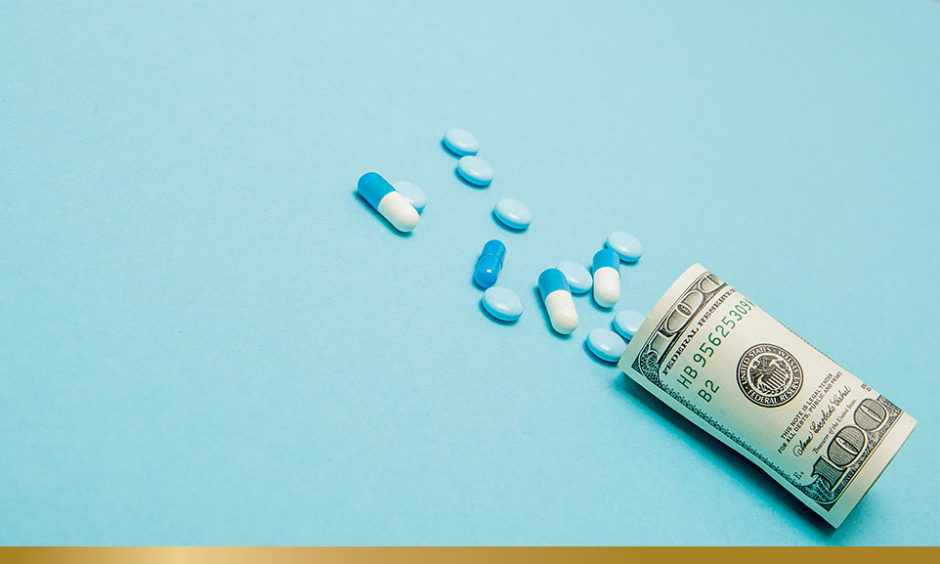 A dollar note with pills and capsules