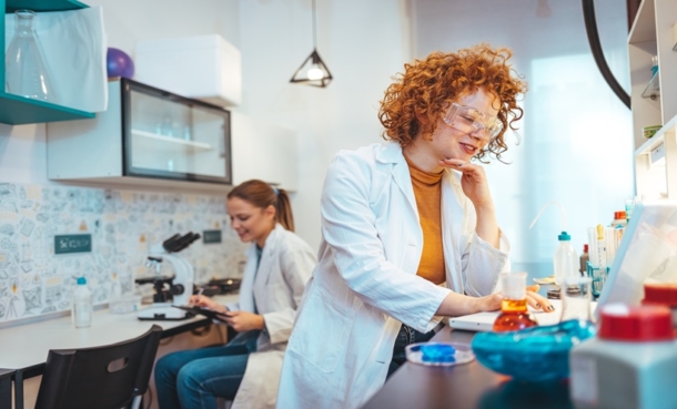 Illustration of blood cells and bone marrow themed laboratory imagery representing mRNA vaccination and haematopoietic malignancy research