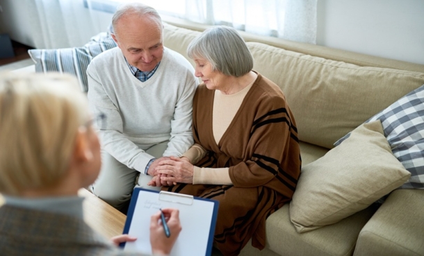 Older adult discussing pulmonary tuberculosis outcomes and comorbidity risk with a healthcare professional.