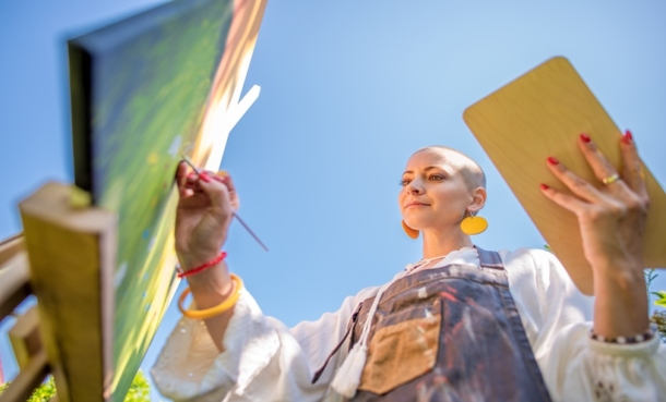 Patient practicing mindfulness-based stress reduction to manage chemotherapy-related distress during colorectal cancer care.