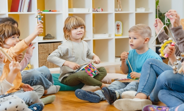 Child participating in music-based occupational therapy for ADHD attention support