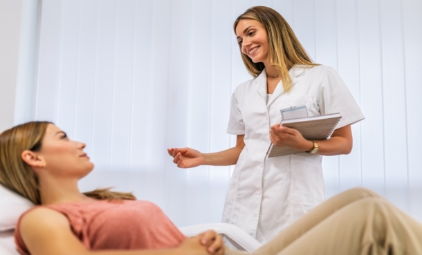 Doctor consulting a patient about facial skin concerns after cosmetic injections