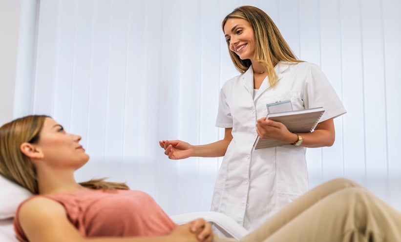 Doctor consulting a patient about facial skin concerns after cosmetic injections