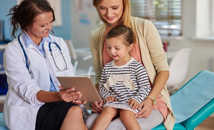 Child undergoing pediatric neurology consultation for drug-resistant epilepsy and seizure treatment.