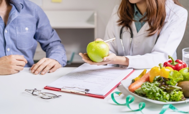 Patient discussing Mediterranean diet and fibromyalgia lifestyle management with a healthcare professional