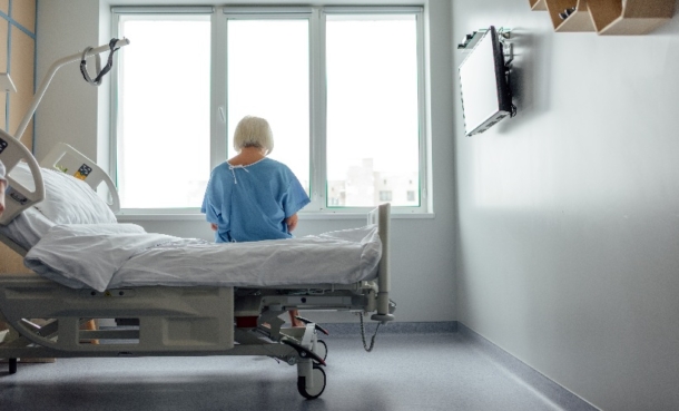 Man in hospital bed