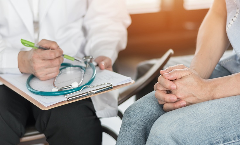 doctor discussing ovarian cancer with patient
