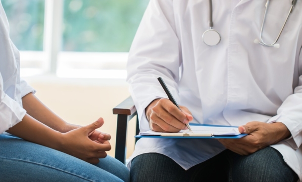 cancer survivor patient having consultation with psychiatrist survivorship