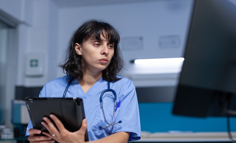 Healthcare shift worker resting, illustrating sleep quality and respiratory infection susceptibility.