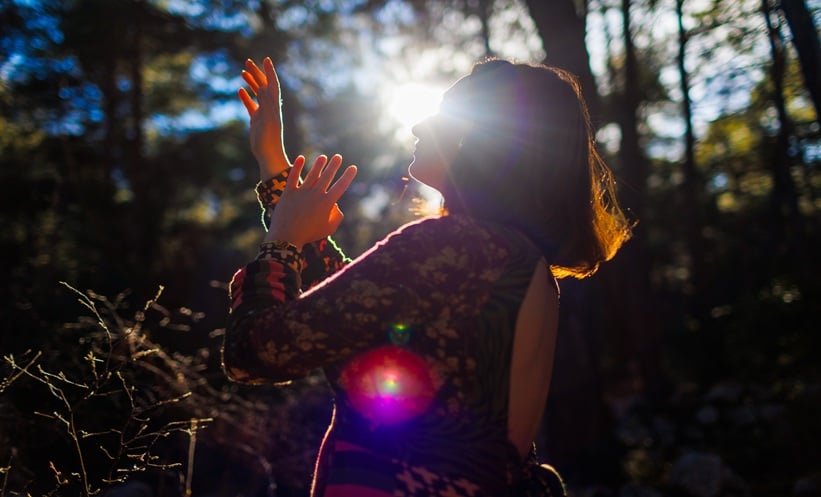 Person moving outdoors, symbolizing psilocybin effects on motor function and perception.