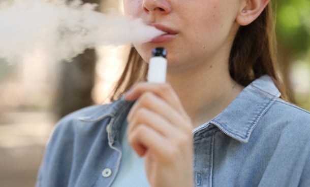 Young girl vaping