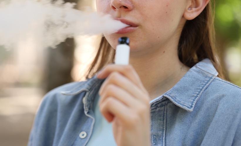 Young girl vaping