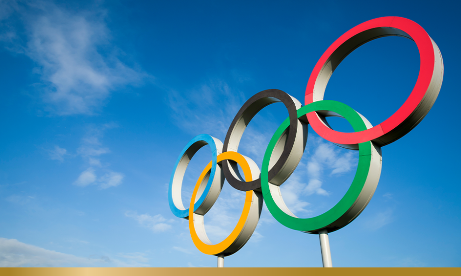 Olympic rings against blue sky