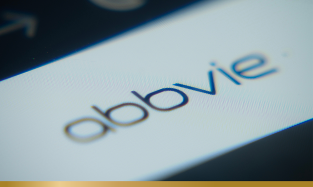 A Close-up of a laptop screen is displaying the AbbVie web interface in a browser.