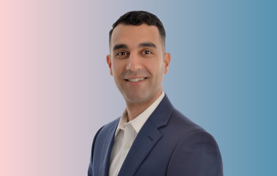 Headshot of Furat Shawki on pink and blue background