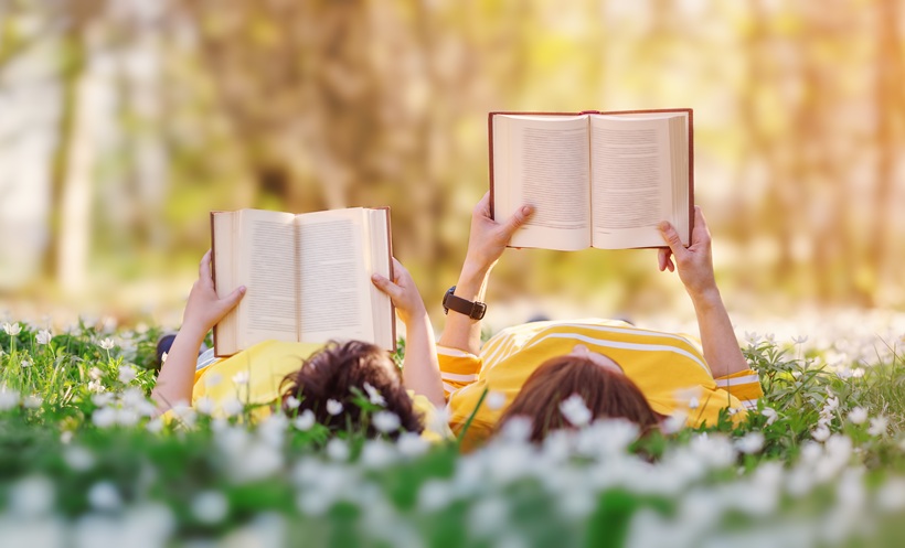 People reading in the grass
