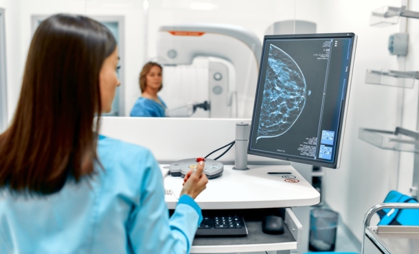 woman with suspected breast cancer being evaluated