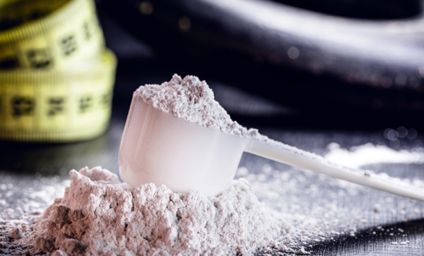 scoop of creatine supplement