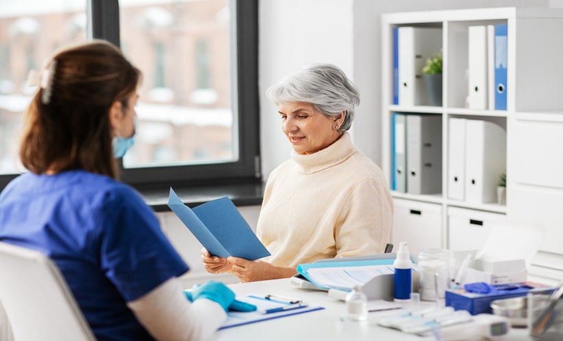 Older adult with heart failure discussing RSV vaccination with a healthcare professional.