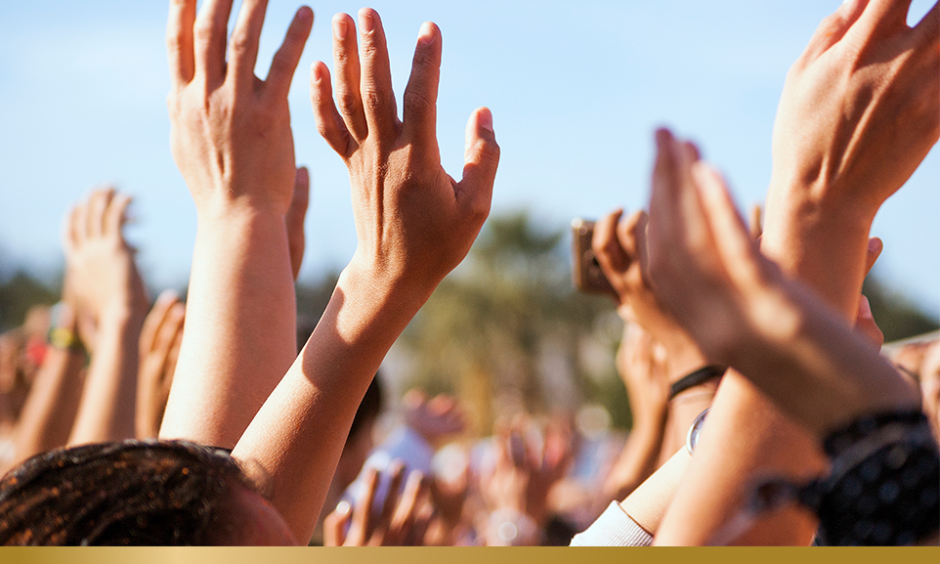 Crowded people hands up