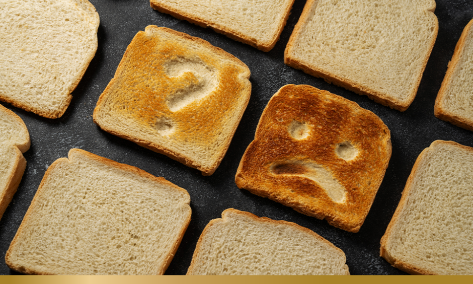 Slice of toasted bread with sad face